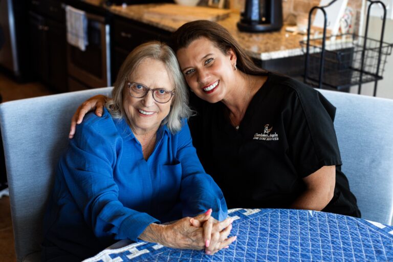 Charlotte's Angels caregiver with a senior client receiving in-home Alzheimer's care in Joplin